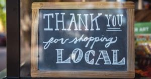a thank you for shopping local sign
